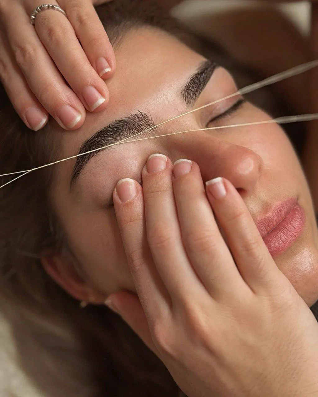 Eyebrow threading